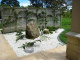 Japanese Garden with espaliered crabapples on the background trellis