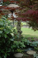 Running water and stone sculpture add the "wow factor" to any garden